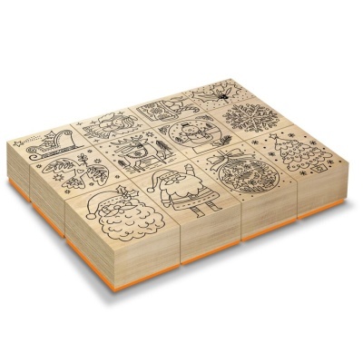 Conjunto de carimbos de madeira natalícios com ilustrações a preto.