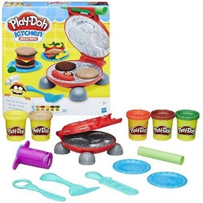 Conjunto Play-Doh máquina de hambúrguer com massa e utensílios coloridos em embalagem amarela.