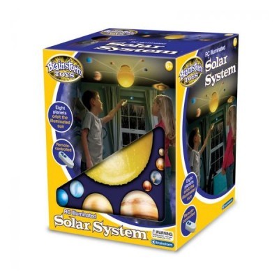 Caixa do brinquedo Solar System iluminado com planetas e criança a brincar