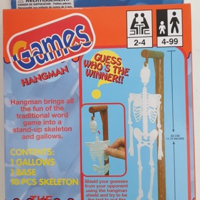 Jogo Hangman com esqueleto e forca, embalagem laranja e azul