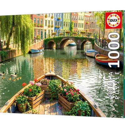 Caixa de puzzle EDUCA 1000 peças com imagem de barco com flores em canal e casas coloridas
