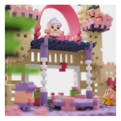 Castelo de blocos de encaixar com personagens quadrados e detalhes coloridos
