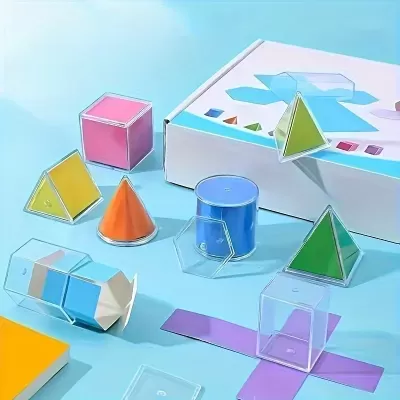 Brinquedos educativos de formas geométricas em plástico colorido com caixa branca
