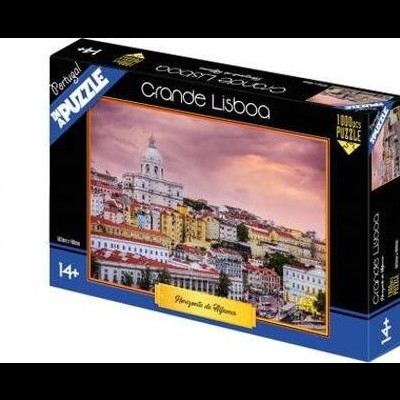 Caixa de puzzle com imagem de Lisboa ao pôr-do-sol.