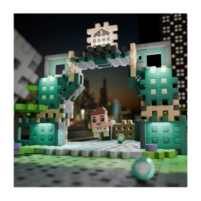 Blocos plásticos formando arquivolto com texto BANK e personagem cubo