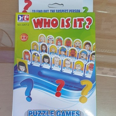 Embalagem do jogo WHO IS IT? com ilustrações de personagens e texto PUZZLE GAMES
