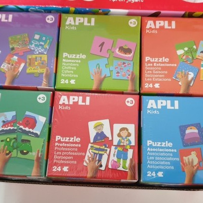 Seis puzzles APLI Kids, 24 peças cada, embalagens coloridas com várias ilustrações.