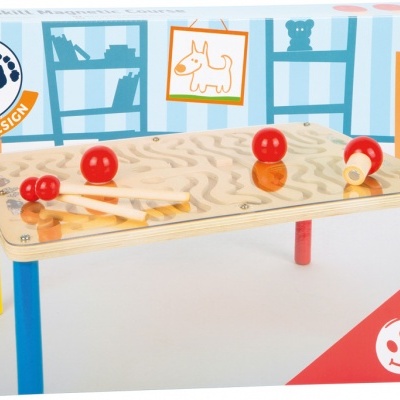 Mesa de brinquedo colorida com peças magnéticas e texto da embalagem