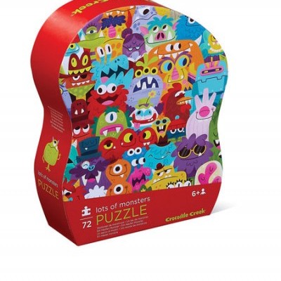 Caixa vermelha de puzzle com ilustração colorida de monstros em várias cores