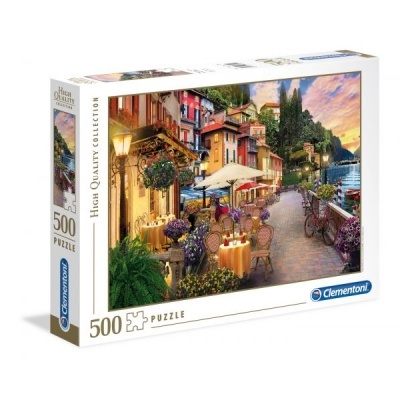 Caixa de puzzle Clementoni 500 peças com imagem de uma rua colorida e iluminada ao entardecer