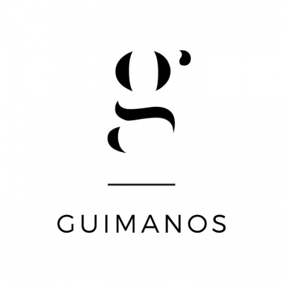 Logótipo preto abstrato com a palavra GUIMANOS em letras maiúsculas pretas