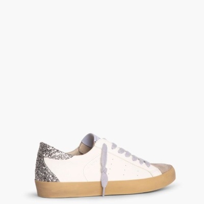 Ténis branco com sola castanha e calcanhar prateado