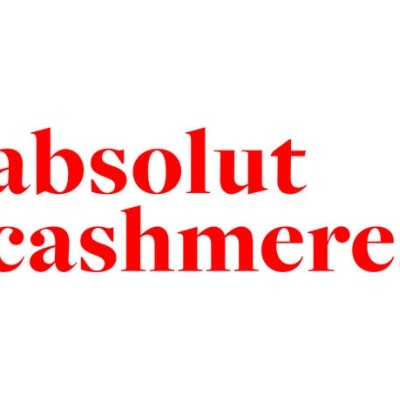 Texto 'absolut cashmere.' vermelho em fundo branco