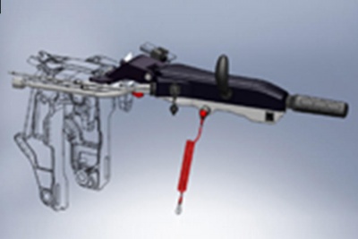 Estrutura mecânica metálica com peça preta e cabo vermelho