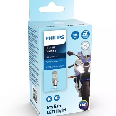 Embalagem azul claro do produto Philips LED-HL luz LED para mota com informações técnicas e imagem de mota azul.