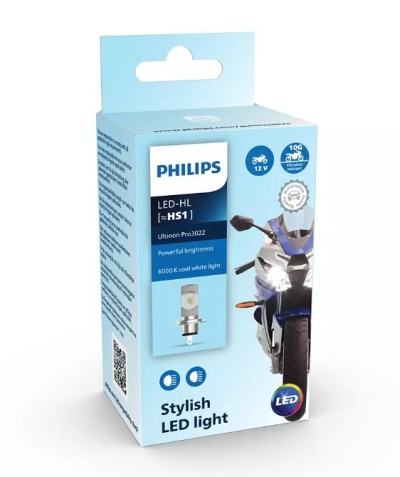 Embalagem azul claro do produto Philips LED-HL luz LED para mota com informações técnicas e imagem de mota azul.