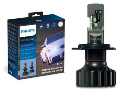 Lâmpada automóvel LED Philips com caixa azul e preta mostrando um carro branco