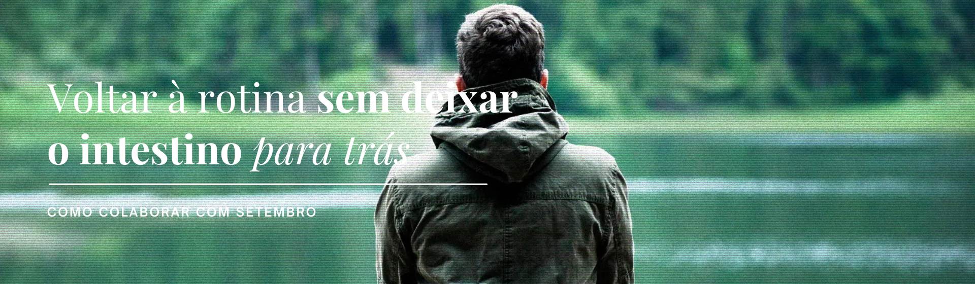 Homem de costas com casaco verde em frente a lago e floresta, texto sobre intestino e setembro