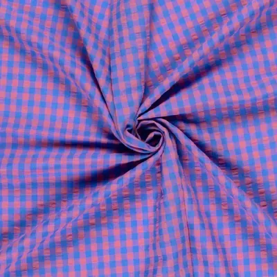 Tela de algodón azul y rosa con patrón de cuadros pequeños