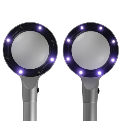 Dois espelhos redondos com luzes LED integradas na moldura preta