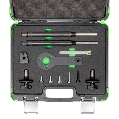 Estojo preto e verde com ferramentas organizadas em espuma preta