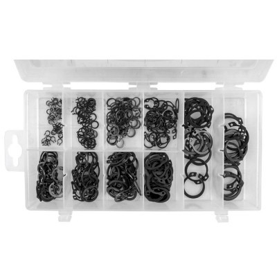 Caixa transparente com anilhas e arruelas pretas de metal organizadas por tamanho.