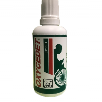 Frasco branco de lubrificante para bicicletas OXYCEDET com tampa de rosca e etiqueta colorida