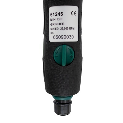 Moedor mini die preto com botão verde e etiqueta branca