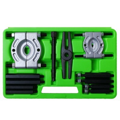 Conjunto de ferramentas com extratores e parafusos num estojo verde organizado