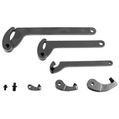 Conjunto de ferramentas metálicas prateadas sobre fundo branco