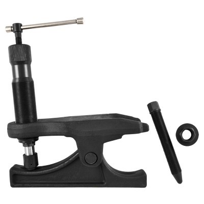 Ferramenta de extração preta com parafuso metálico e alavanca prateada, com dois acessórios pretos ao lado.