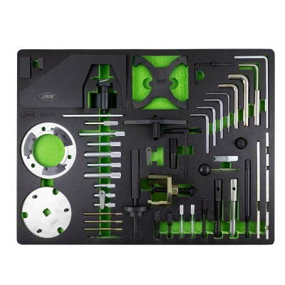 ferramentas organizadas numa base preta com revestimento verde