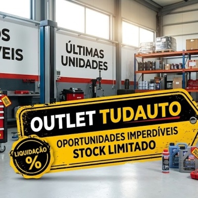 Oficina com ferramentas, óleo e pneus com destaque para anúncios de preços e stock limitado