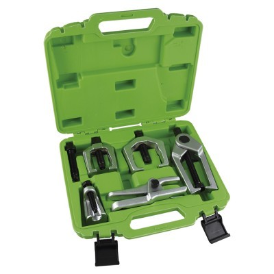 Conjunto de ferramentas metálicas num estojo verde