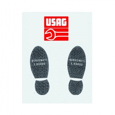 Adesivos pretos em forma de pegadas com texto e logótipo USAG