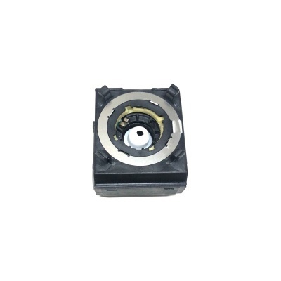 Componente eletrónico quadrado preto com anel metálico circular e eixo branco central