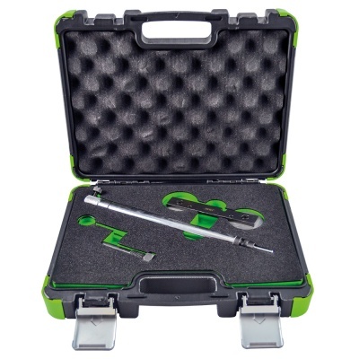 estojo preto e verde com dispositivo metálico e ventosas verdes