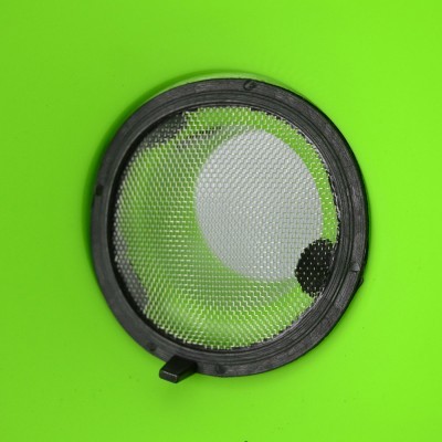 Filtro redondo com moldura preta sobre fundo verde