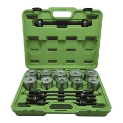 Conjunto de ferramentas em estojo verde com moldes metálicos e barras pretas organizadas