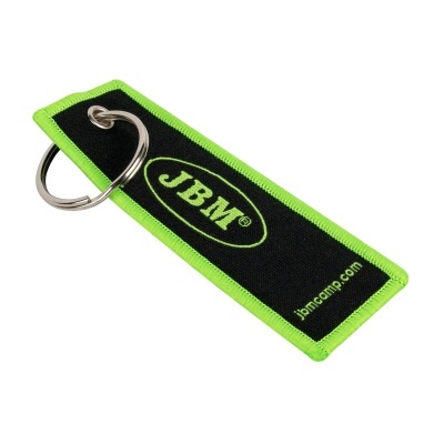 Porta-chaves de tecido preto com bordas verdes e texto JBM®.