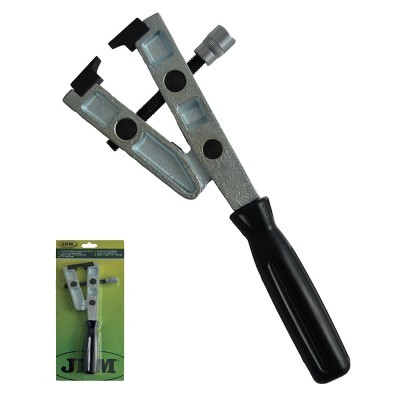 Alicate preto com peças metálicas prateadas e embalagem verde amarelada