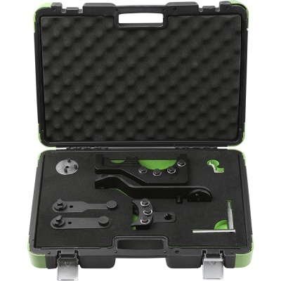 Estojo aberto com peças metálicas para montagem em espuma protetora