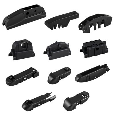 Peças plásticas pretas variadas para montagem