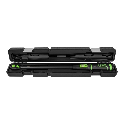 Chave de torque preta com detalhes verdes numa caixa preta rígida.