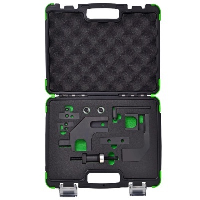 Estojo preto e verde com peças metálicas embutidas na espuma moldada