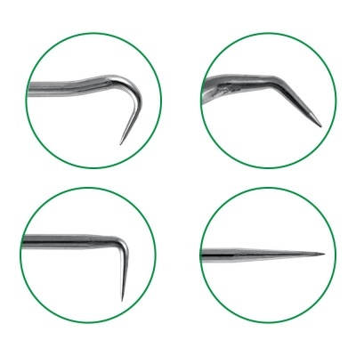 Extremidades metálicas pontiagudas em círculos verdes sobre fundo branco