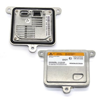 Dois módulos eletrónicos retangulares em alumínio cinzento com etiquetas e texto visível.