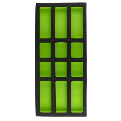 Organizador de espuma preta com compartimentos verdes