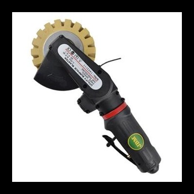 Ferramenta elétrica preta com disco amarelo dentado e etiqueta com texto