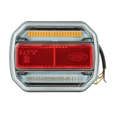 Lanterna traseira de veículo prateada com luzes amarela, vermelha e branca